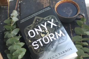Cover of “Onyx Storm” by Rebecca Yarros – trending BookTok romantasy novel featured in 2025 viral book lists.